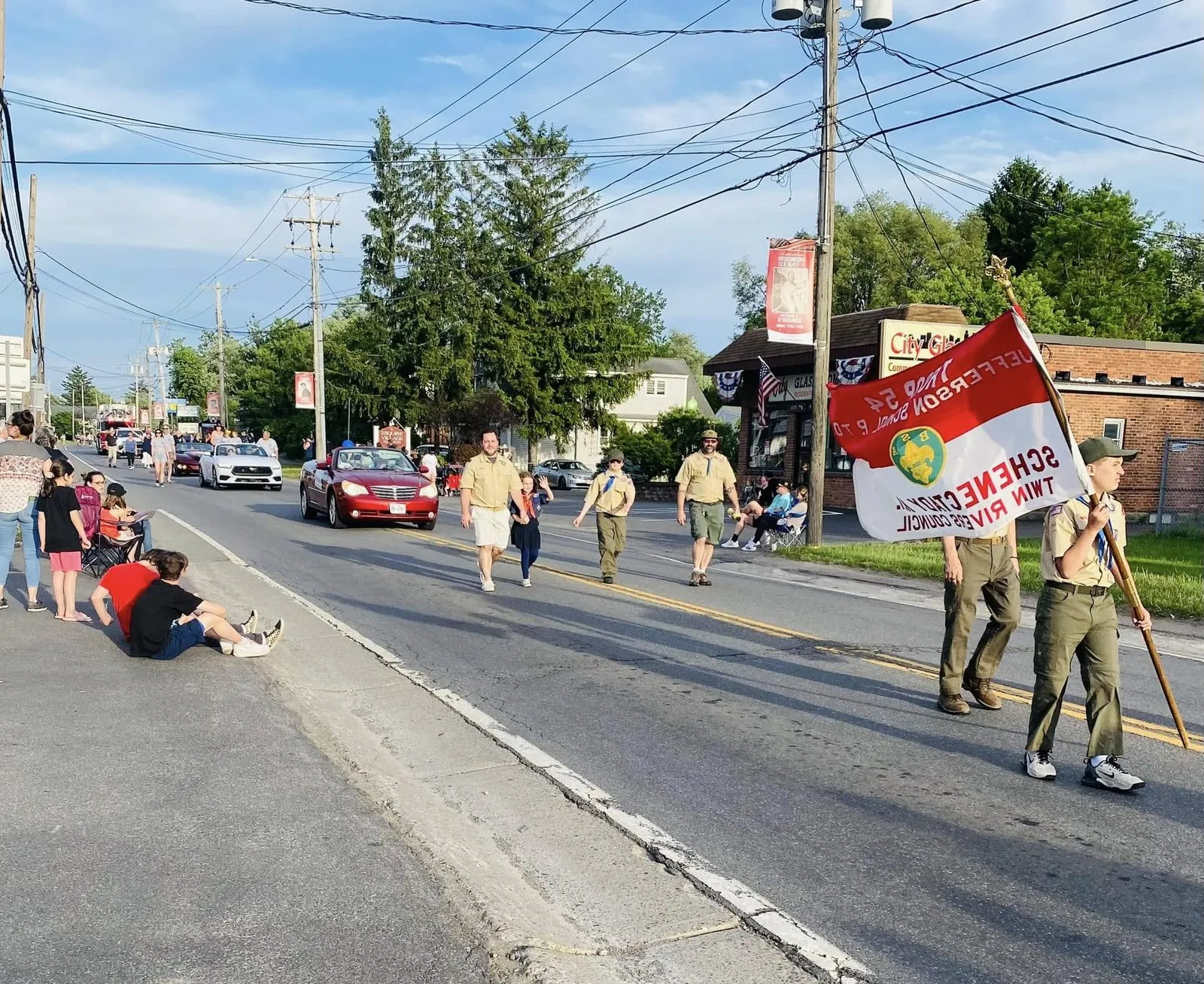 Will Mau marching with Scouts in a local parade